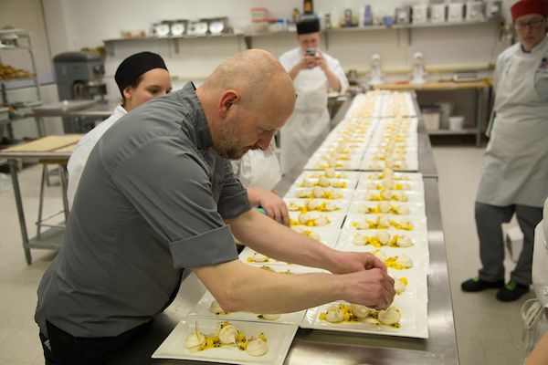 Chef Neil Dowson of Midtown Brewery plates a dessert featuring meringue and passionfruit for Art of Flavour dinner series.